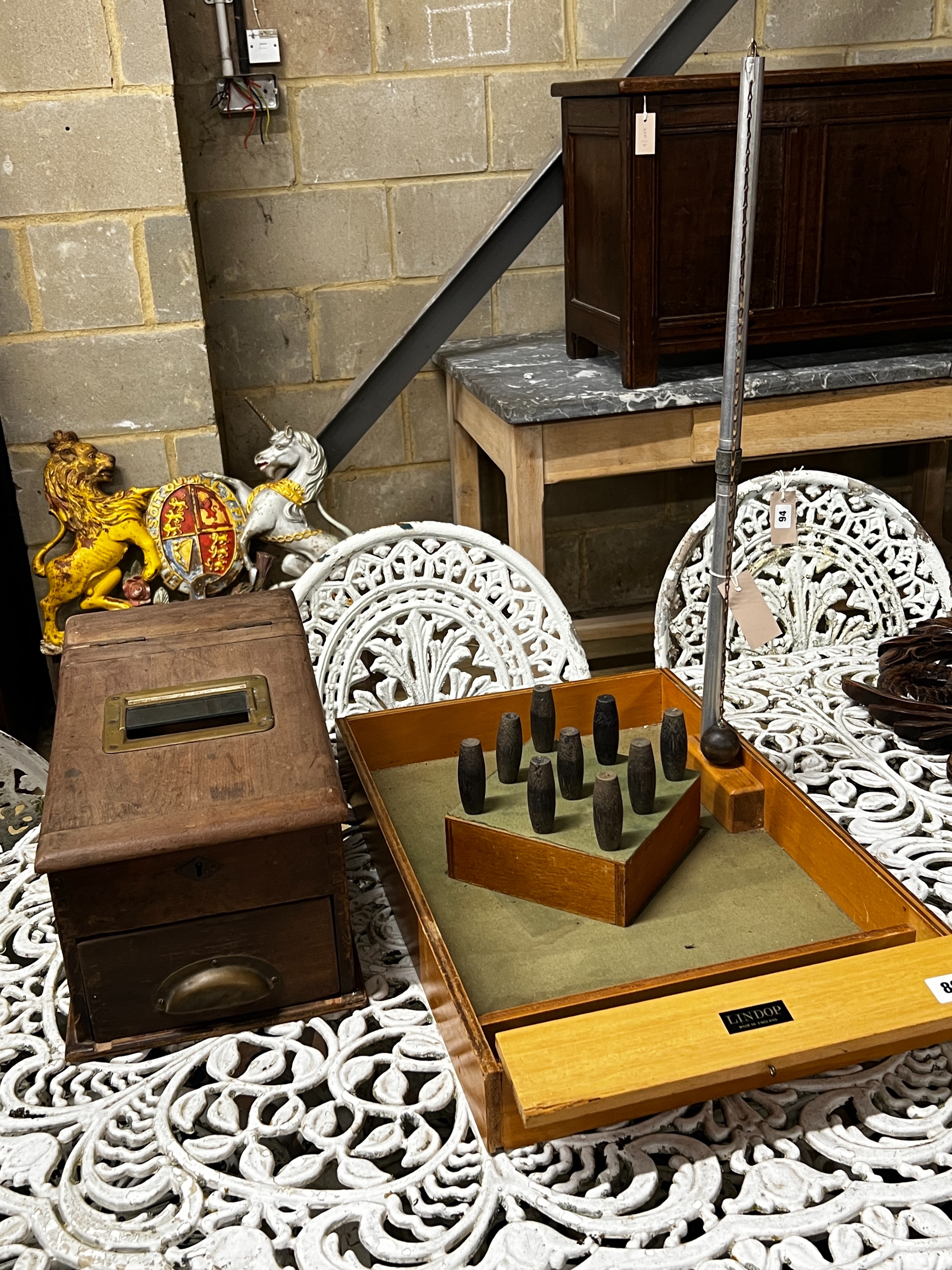 A vintage Lindop table skittles game and a Victorian mahogany till